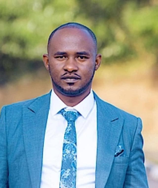 Christian HAGENIMANA official REG employee-recognition portrait